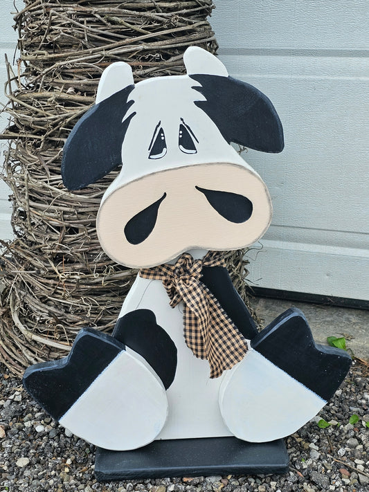 Addition to our Farm Family Collection. Our Holstein Cows bring country charm to any front porch or home decor.