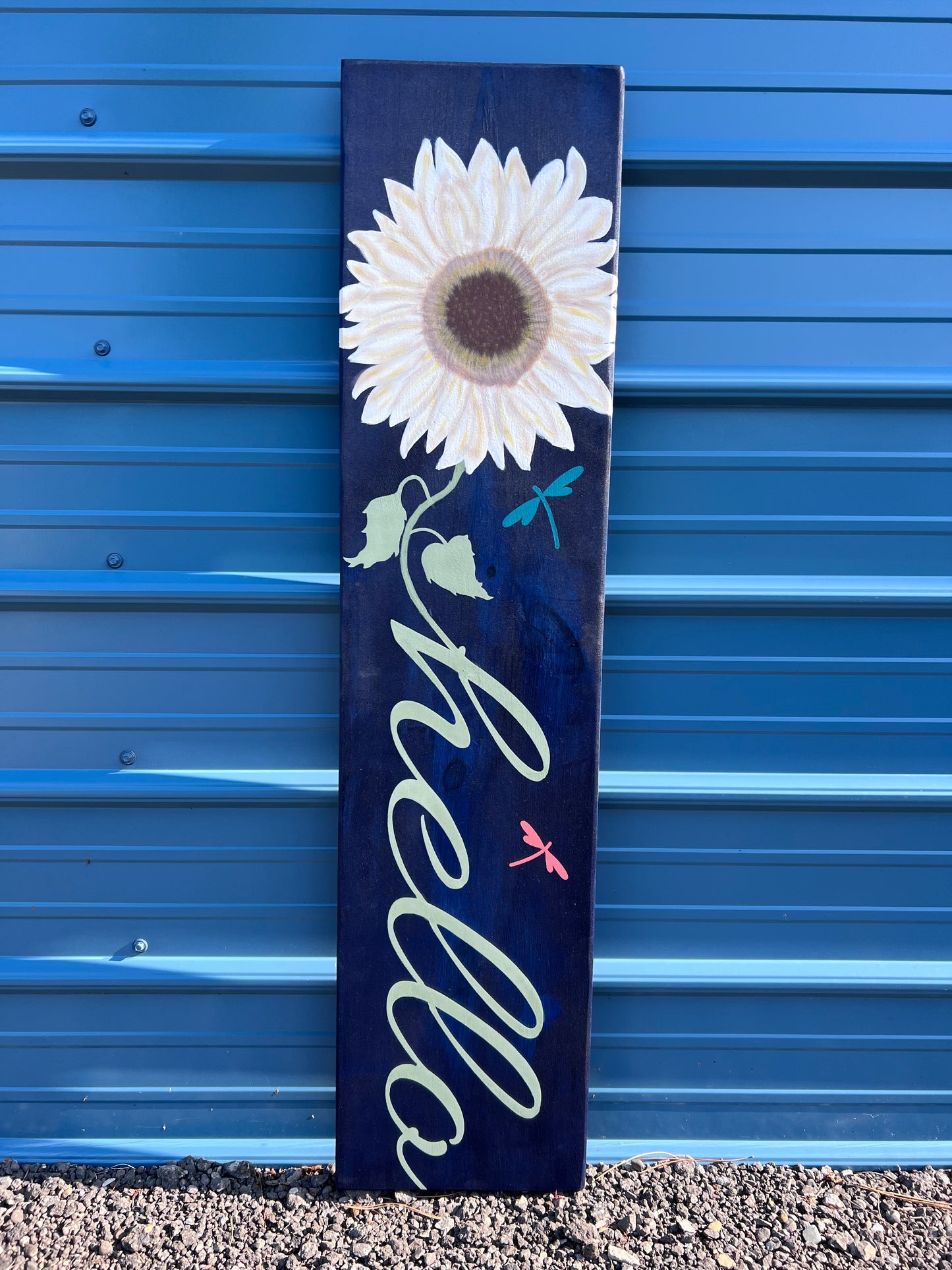 Hello Porch leaner with large Daisy flower and dragonflies.