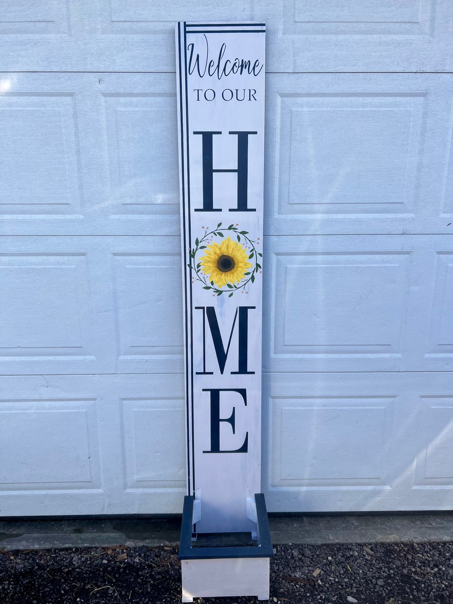 Summer Welcome to our home porch leaner with flower pot container.